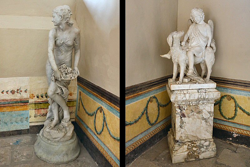 the sculptures on the staircase