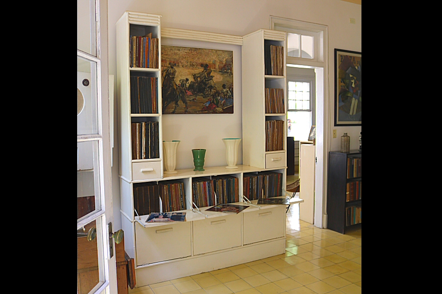 the cabinet full of musical plates