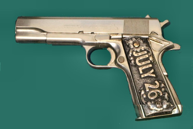 1911 model, gold and silver coated Colt that was the gift of the famous American writer Frank Waters to Fidel Castro Ruz,