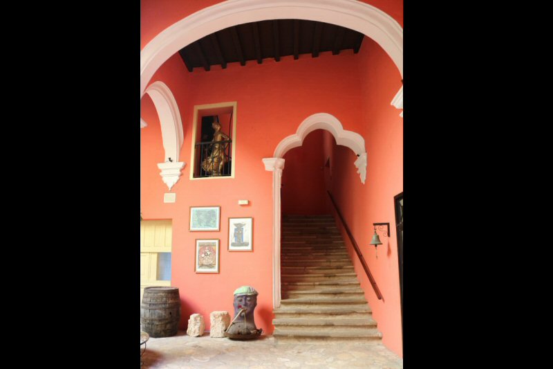 the ringing bell next to the wide staircase starts the museum tour