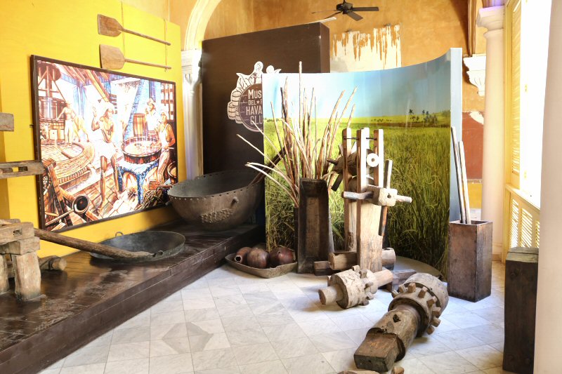 some cauldrons and some tools remained from a sugar cane mill