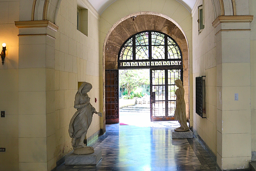 the corridor after the entrance that leads to the garden