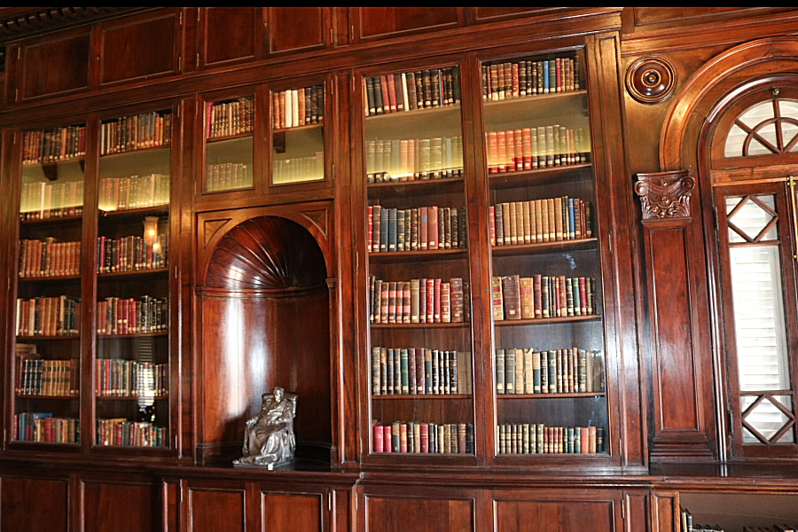 the bronze bust of the Emperor that stands in a niche in the center of the library, is the work of Colombo