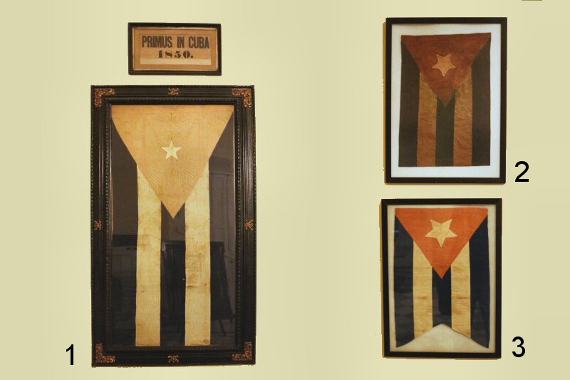 ❶ the original flag waved for the first time in Cárdenas in 1850, initiating the Ten Years War. In the Assembly of Guáimaro, the first constitutional assembly, in 1869, it was declared as the national flag of the Republic of Cuba in Arms.
❷ the pennant, made of silk, is the first model of the Cuban flag, designed by Narciso López and a group of patriots exiled in New York.
❸ the pennant was brought to Cuba by Colonel O'Hara in 1850.